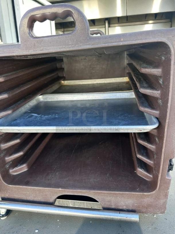 Carlisle insulated food transport carrier, commercial model, premium condition, brown color, NSF certified, with shelf racks.