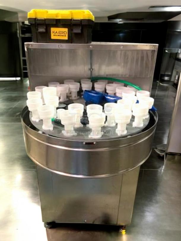 Tang Rotary Round Bottle Washer, stainless steel, automatic rinse, excellent condition, with attached storage box, fully tested.