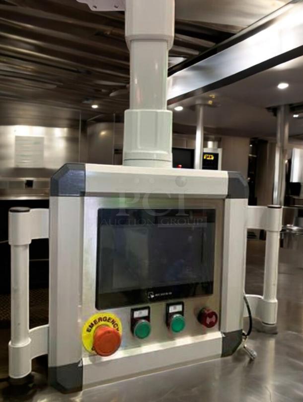 TANG Two-Head Automatic Filling System control panel in premium condition, featuring emergency and operation buttons.