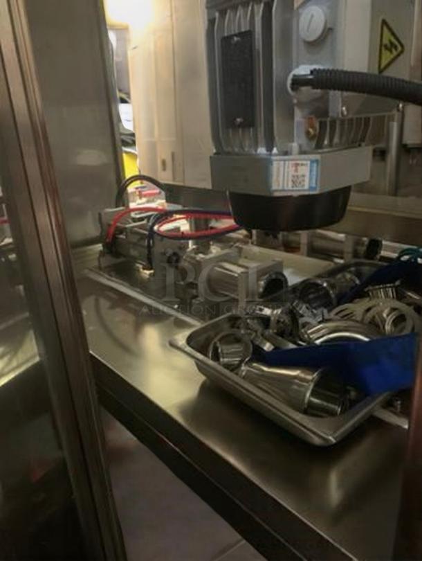 TANG Two-Head Automatic Filling Machine, premium condition, precision volume filler for sauces. Tested, operational, model TAN-L-FIL-0423.
