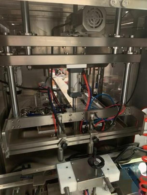 Premium TANG Two-Head Fully Automatic Filling Machine, precision volume filler for sauces and liquids, fully tested, operational.