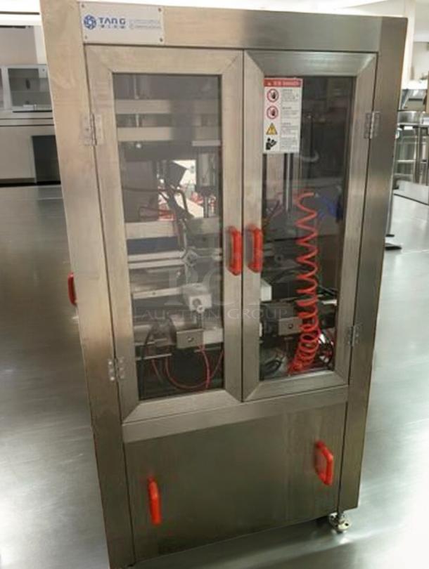 Tang Machinery Four-Station Vacuum Capper, semi-automatic, premium condition, stainless steel, fully tested, model TNG-L-CAP-0424.