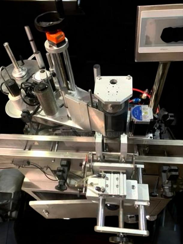 Tang Machinery TGM-TY01 automatic round bottle labeling machine, premium condition, 360° wrap-around, high-speed application.
