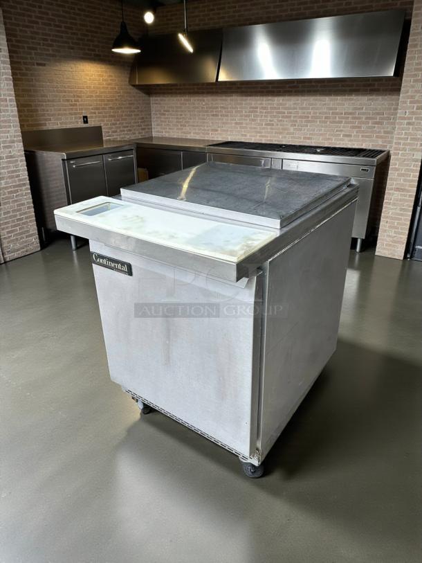 Continental SW27-12M refrigerated sandwich prep unit, 27" wide, 7.4 cu. ft., outstanding condition, UL & NSF listed.