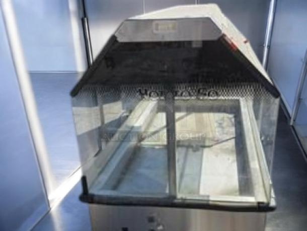 Very good Duke E304 4-well electric steam table with sneeze guard, fully tested, 208V, made in USA.
