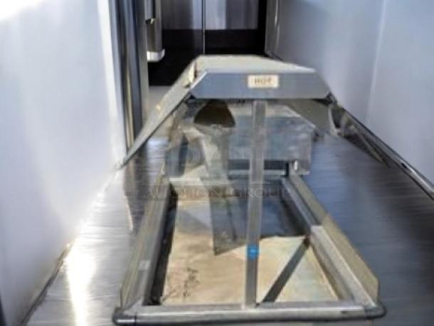 Very good condition Duke E304 4-well electric steam table with sneeze guard, 208V, fully tested, by Duke Manufacturing.