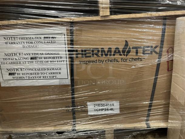 Factory sealed Therma-Tek TCHP24-4L gas hot plate with 4 burners, in new condition. Packaging notes for damage claims visible.