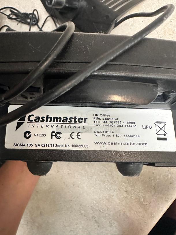 Cashmaster Sigma 105 cash counting machine label, showing model and serial numbers. Item is in outstanding condition.