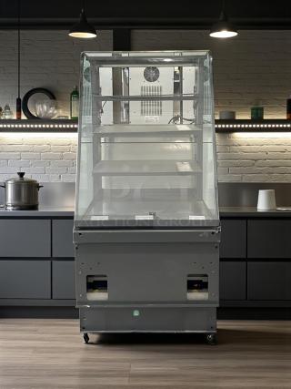 Curved glass refrigerated display case, excellent condition, 4 adjustable shelves, 115V, UL listed, fully tested, branded by Commercial Refrigeration Manufacturer.