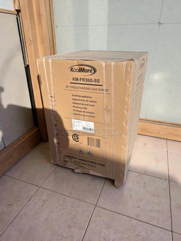 Boxed KoolMore 30" Freestanding Gas Range, model KM-FR30G-SS, like-new scratch & dent condition, labeled for care.