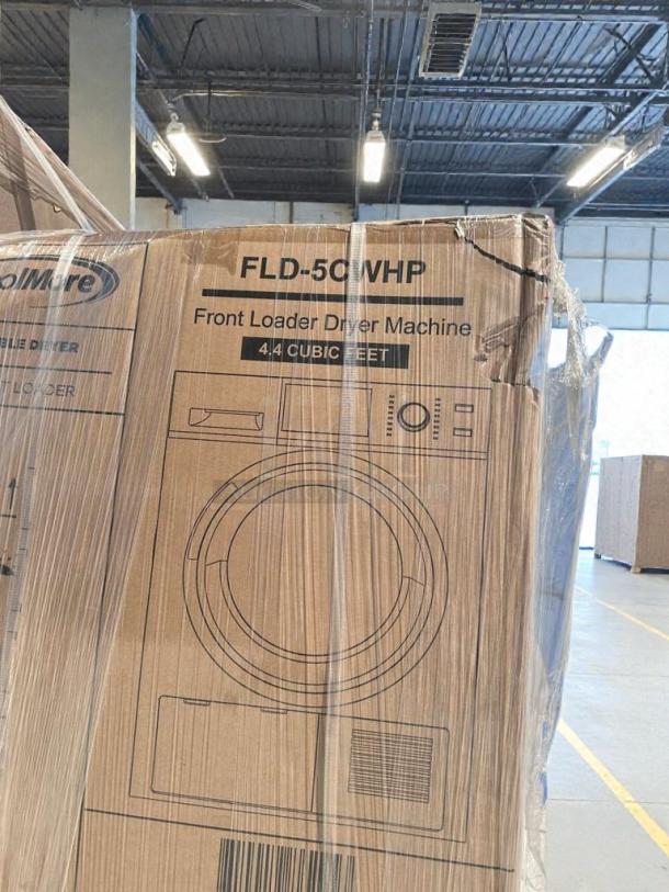 Brand new KoolMore FLD-5C-WHP front load electric dryer, 4.4 cu. ft., scratch & dent in packaging, model info visible.