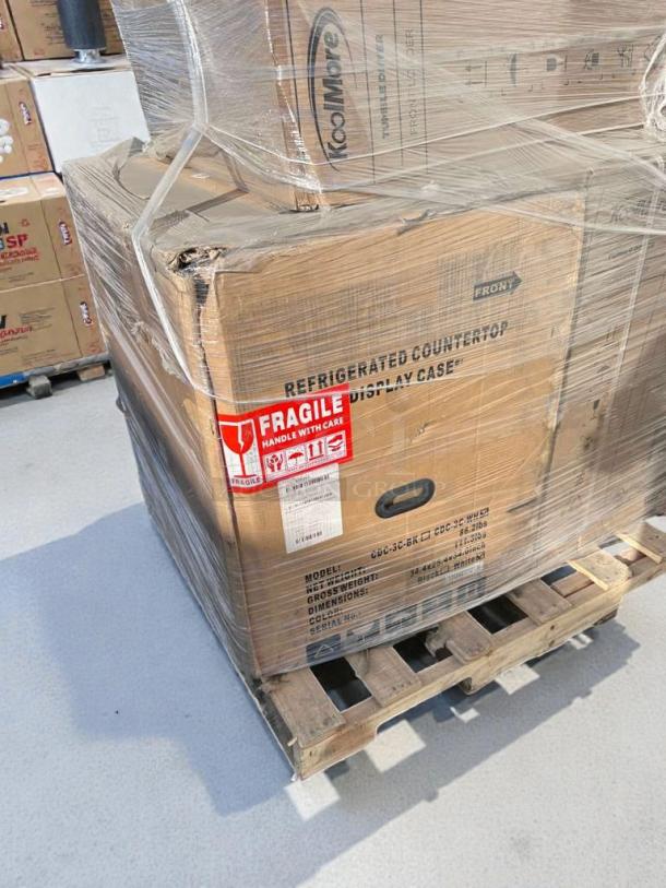 Brand-new KoolMore refrigerated countertop display case (model CDC-3C-BK/WH) in original packaging, scratch & dent condition.