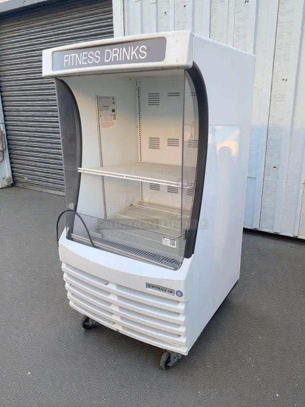 Beverage-Air BZ13-1-W open merchandiser in excellent condition; 115V, single-phase, fully tested; "Fitness Drinks" label.