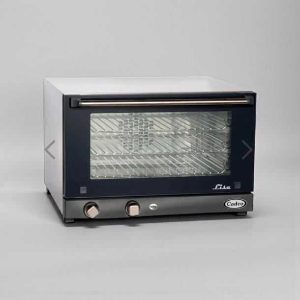 Cadco Lisa OV-013 convection oven in top-tier condition, featuring dual knobs, glass front, and silver handle. Fully tested, 208–240V.