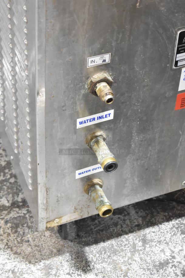 Carpigiani LB-502 batch freezer, water cooled, 208/230V, 3-phase. Visible water inlet and outlet labels on side.