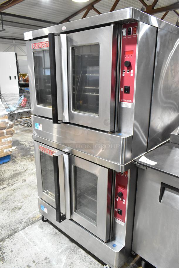 Two 2023 Blodgett Zephaire-100-E commercial convection ovens, view-through doors, thermostatic controls, on casters, 208V, 3-phase.