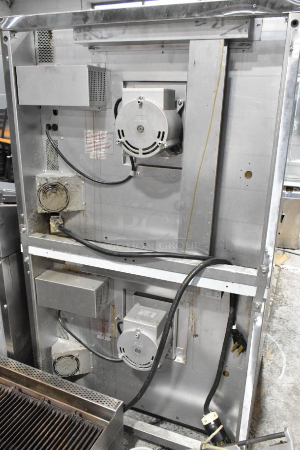 Pair of 2023 Blodgett Zephaire-100-E electric convection ovens, view-through doors, thermostatic controls, on casters.