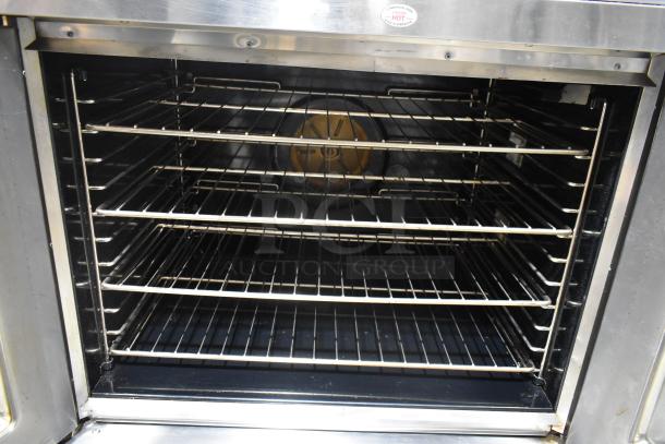 2 Blodgett Zephaire-100-E convection ovens with view-through doors, stainless interior, on casters, 208V, 3 phase.