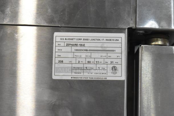 Label on Blodgett Zephaire-100-E convection oven, showing model, serial number, 208V, 3-phase, UL/CSA standards.
