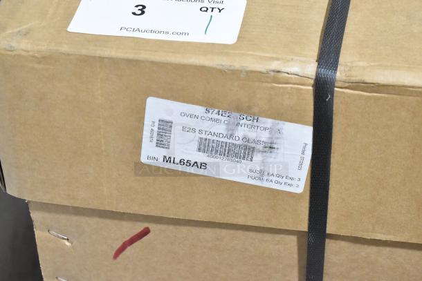 Brand new Merrychef eikon e2s rapid cook oven in original packaging. Minor scratches and dents noted. Model: 2023, 208/240V.