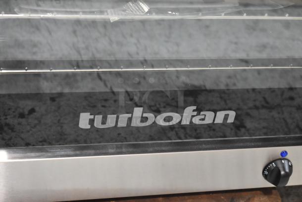 BRAND NEW 2024 Moffat Turbofan E27M3 electric convection oven, 208V, 1 phase. Minor scratches. "Turbofan" label visible.