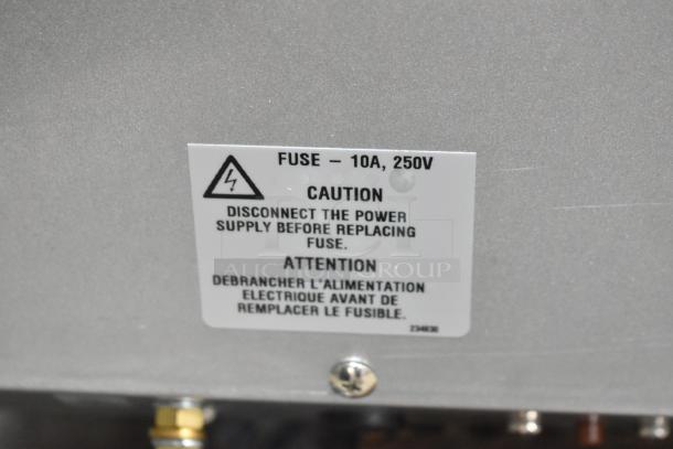 BRAND NEW SCRATCH AND DENT! Moffat Turbofan E27M3 Convection Oven, 208V, 1 Phase. Label showing fuse 10A, 250V caution.
