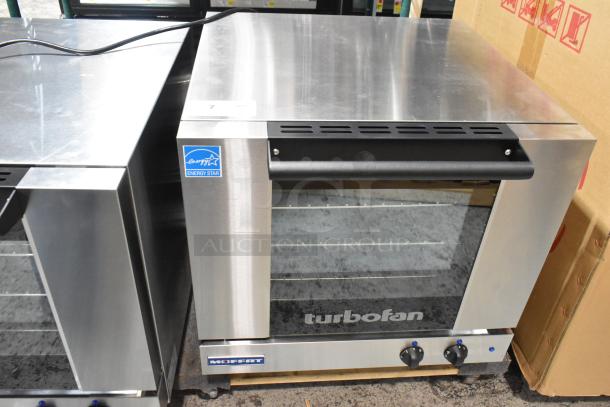 Brand new Moffat Turbofan E23M3 convection oven, 2024 model, half-size, electric, 208V, 1 phase. Energy Star label visible.