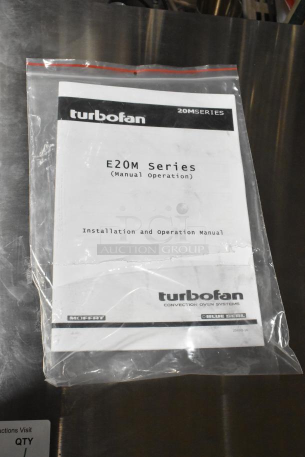 Manual for Moffat Turbofan E20M Series Convection Oven, indicating manual operation. Plastic cover with branding visible.