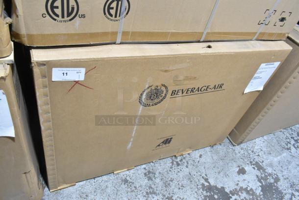 Beverage Air UCF48AHC-23 undercounter freezer in a cardboard box. New condition, slight scratches, labeled 115V, 1 phase.