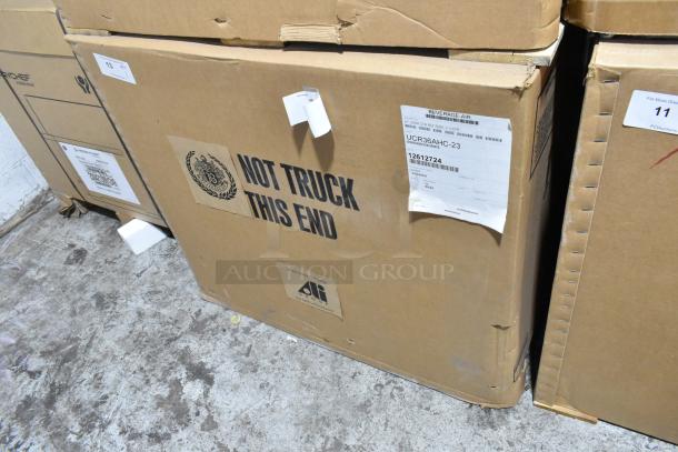 Brand new Beverage Air UCR36AHC-23 undercounter freezer in original packaging. Visible labels specify model and handling instructions.