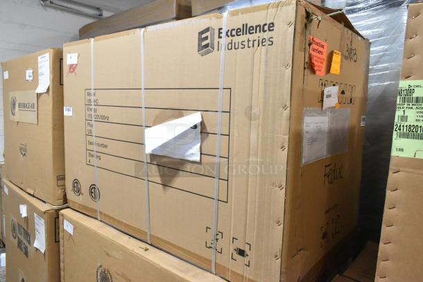 New Excellence 215VB5LHC freezer in carton. 12.9 cu. ft., 115V, 1 phase. Scratch and dent visible. Packaging details present.