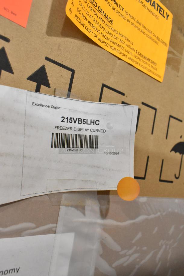 Excellence 215VB5LHC commercial freezer packaging, showing model label and caution stickers. Brand new, scratch and dent.
