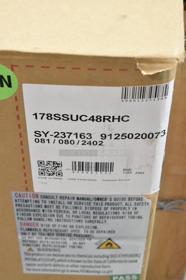 Brand new 2024 Avantco 178SSUC48RHC commercial cooler in box. Model and caution labels visible. Slight box dent.