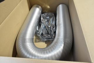 Brand new scratch and dent 95000021 built-in fresh air kit in box, featuring flexible ductwork, ready for installation.