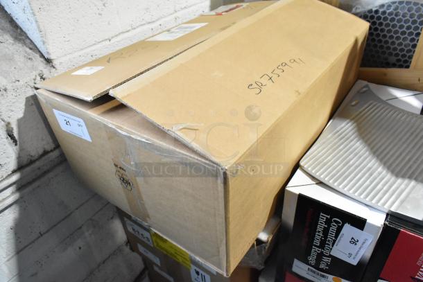 Cardboard box labeled "95000021 Built In Fresh Air Kit," new with some visible dents; item is packaged and marked "SR755991."