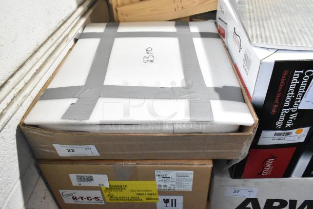 Brand new commercial drain bay strainer in original box, slight scratch and dent. Box labeled "22 QTY" by WCPE Auctions.