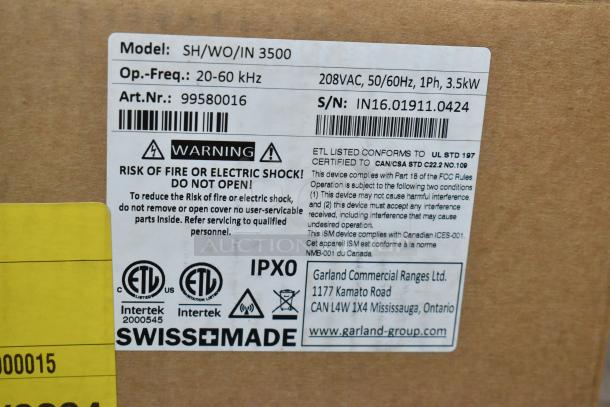 BRAND NEW Garland SH/WO/IN 3500 Wok-Line Induction Wok, 208V, 1 Phase, 3.5kW. Swiss-made, with caution label.