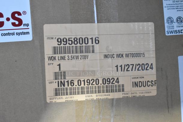 Brown box with label for Garland SH/WO/IN 3500 Induction Wok. Item #99580016, 3.5KW, 208V, delivery date 11/27/2024.