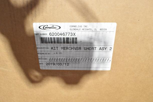 Brand new Cornelius 620046773X kit merchandiser short assembly, labeled as scratch and dent, assembled March 2019.