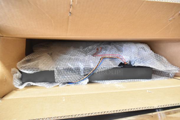 Brand new Cornelius 620046773X Merchandiser Kit in box, slight scratches, bubble-wrapped, wires visible, ready for assembly.