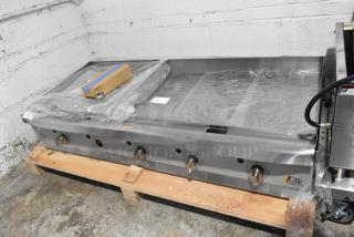 Brand new Cooking Performance Group CPG GT-CPG-60-NL 60" countertop griddle. Natural gas, 150,000 BTU, thermostatic controls, minor scratches.