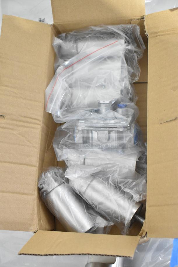Box containing components of the Cooking Performance Group CPG GT-CPG-60-NL griddle, sealed in plastic.
