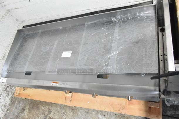 Brand new Cooking Performance Group 60" gas griddle, model 351GTCPG60NL, thermostatic controls, 150,000 BTU, minor scratches.