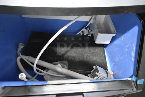 Interior view of a 2025 Avantco Ice UC-F-280-A 26" commercial undercounter ice machine, showing internal components. Model 194UCF280A.