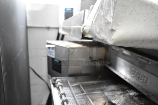 Turbochef HhC2020 conveyor oven in used condition, showing exterior markings and electrical connections. Model number visible.