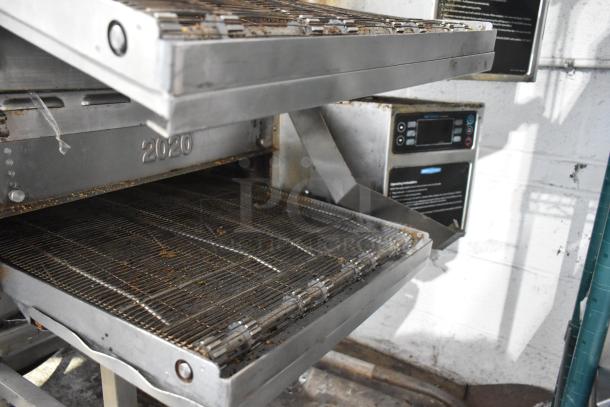 Turbochef HhC2020 commercial conveyor oven, electric, used, 208/240V, 3 phase. Model number "2020" visible.