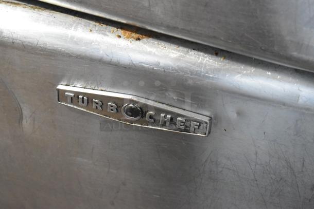 Turbochef HhC2020 commercial rapid cook oven, stainless steel exterior with visible wear and Turbochef logo.