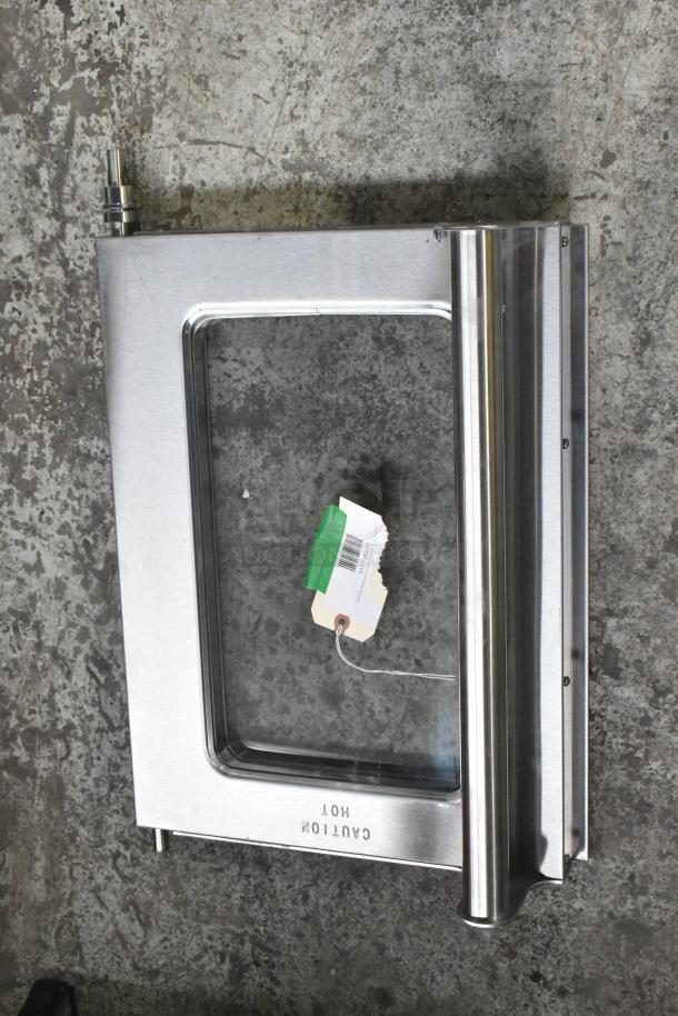 Brand new microwave replacement door with stainless steel finish, "Caution Hot" label, includes scratches and dents.