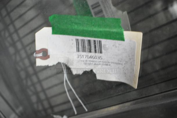 Label with barcode 3517046035, partially covered by green tape, for microwave replacement doors. Scratch and dent condition.