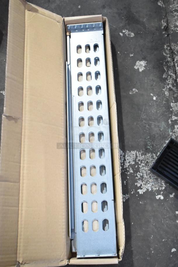 Brand new APC Uninterruptible Power Supply, scratch and dent condition, includes two boxes of metal pieces, as shown.